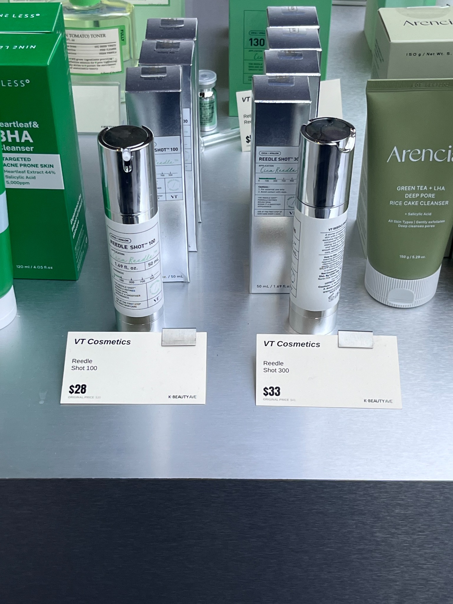 VT Cosmetics Reedle Shot 100 and 300 bottles on a product display